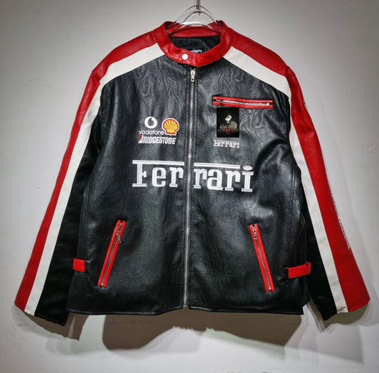Iconic Ferrari Motorsport Leather
Jacket - Black Base with Red Accents & Major Sponsor Patches